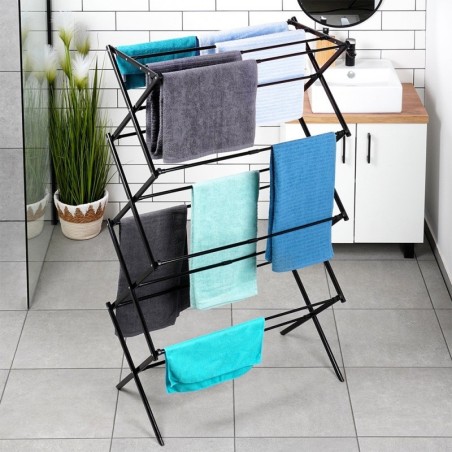 Mustast metallist vertikaalselt pikendatav pesuriiul 43-75x37,5x139 cm